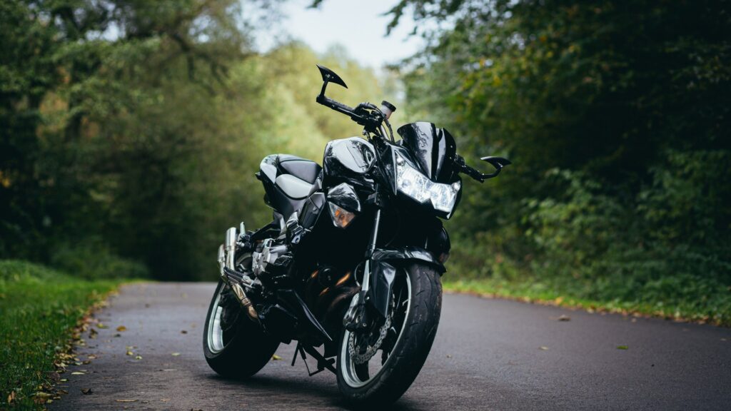 sports motorcycle black on road