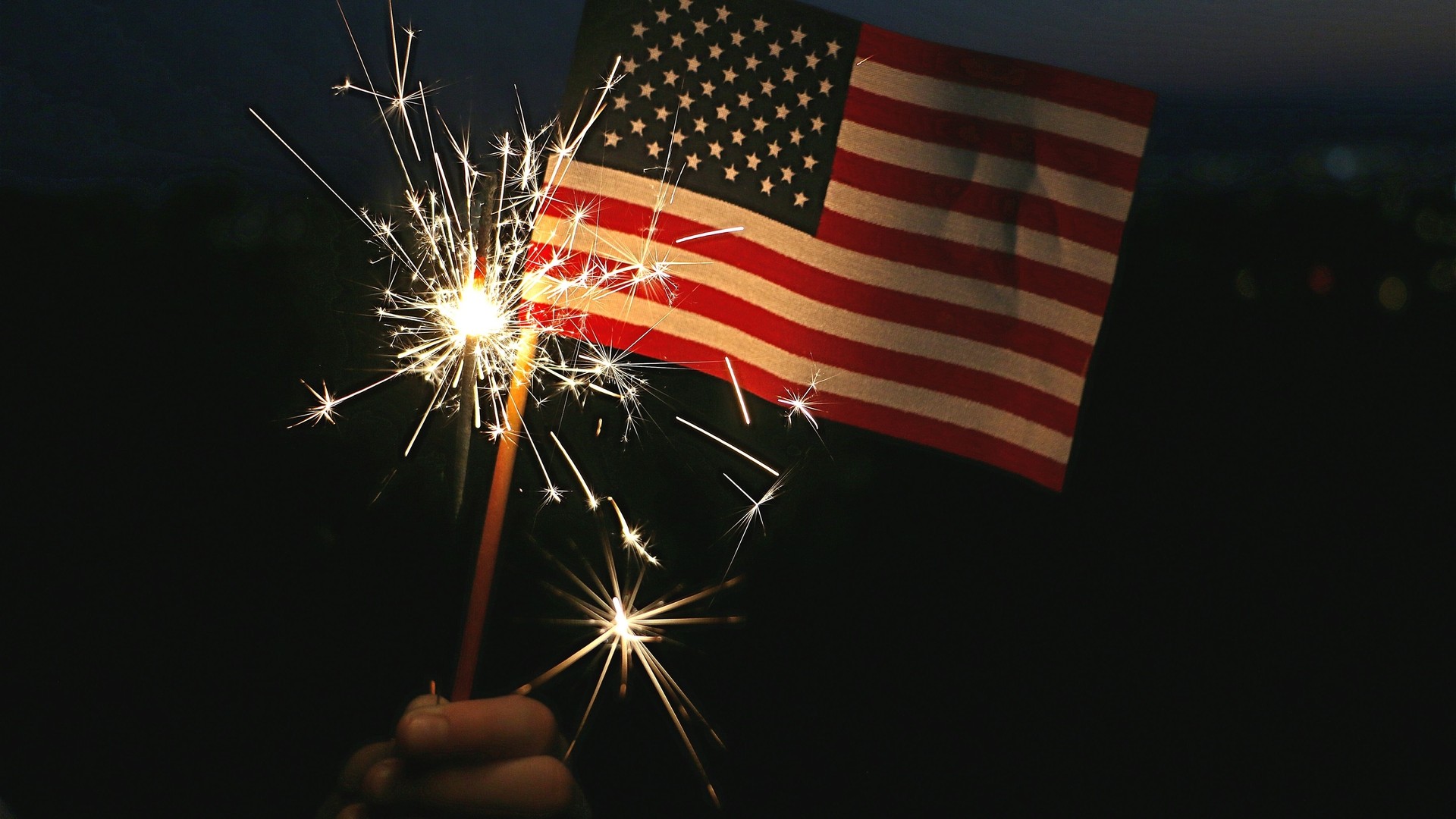 American flag with 4th of July sparkler